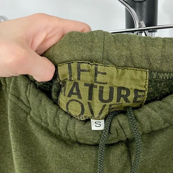 freecity Olive Green Track Joggers with Black Logo and Mustard Accent - Picture 2 of 3